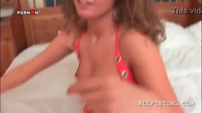 Cutie fists her own cunt